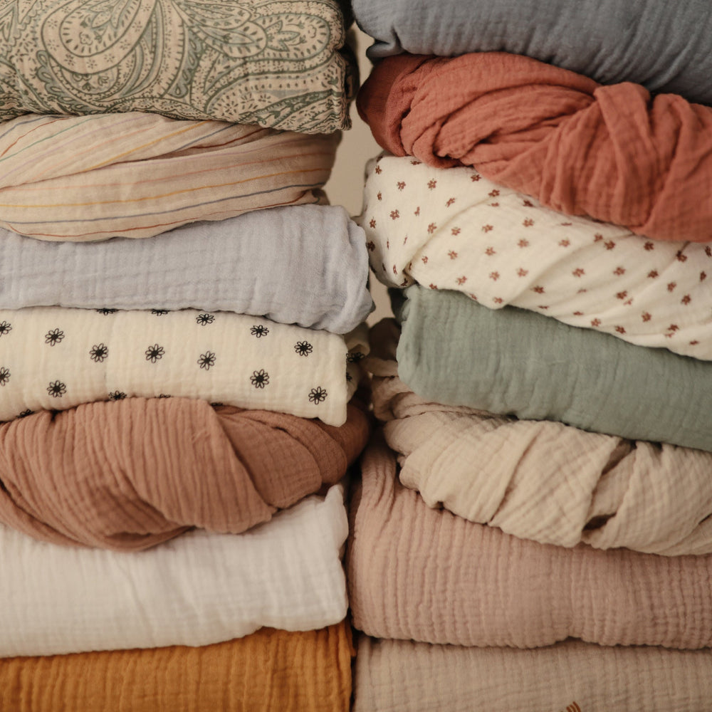 Muslin crib 2025 blanket